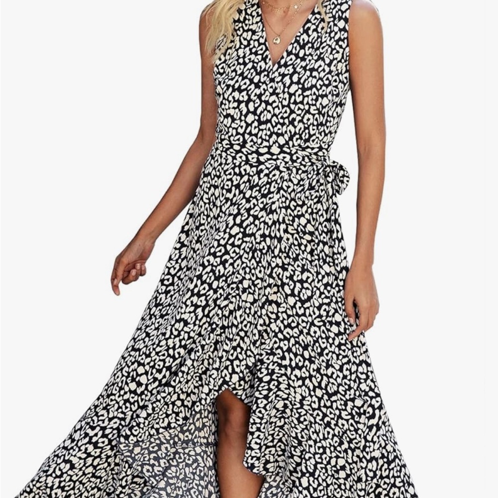 Wrap dress, floral pattern with high low hem.  Never worn, tag still on